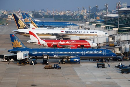 Aircrafts land at Tan Son Nhat International Airport in HCMC (Photo: SGGP) Aircrafts land at Tan Son Nhat International Airport in HCMC (Photo: SGGP)